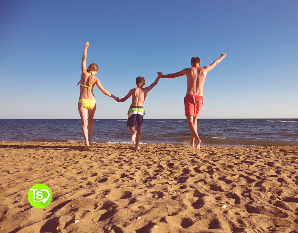 Young family on the beach