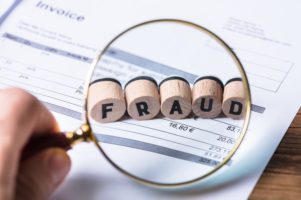 Magnifying glass over the word fraud, a focus of South Carolina timeshare resale law