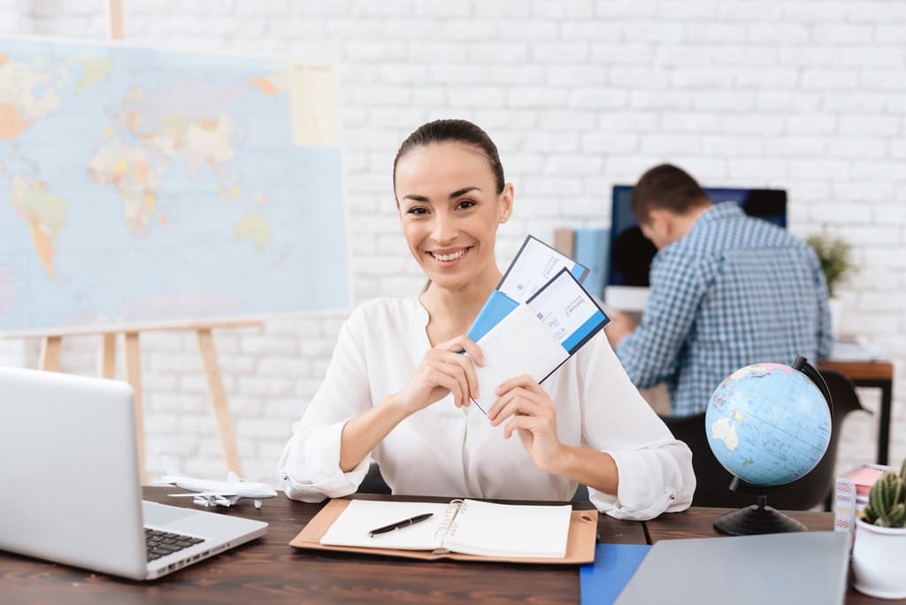 Woman holding tickets