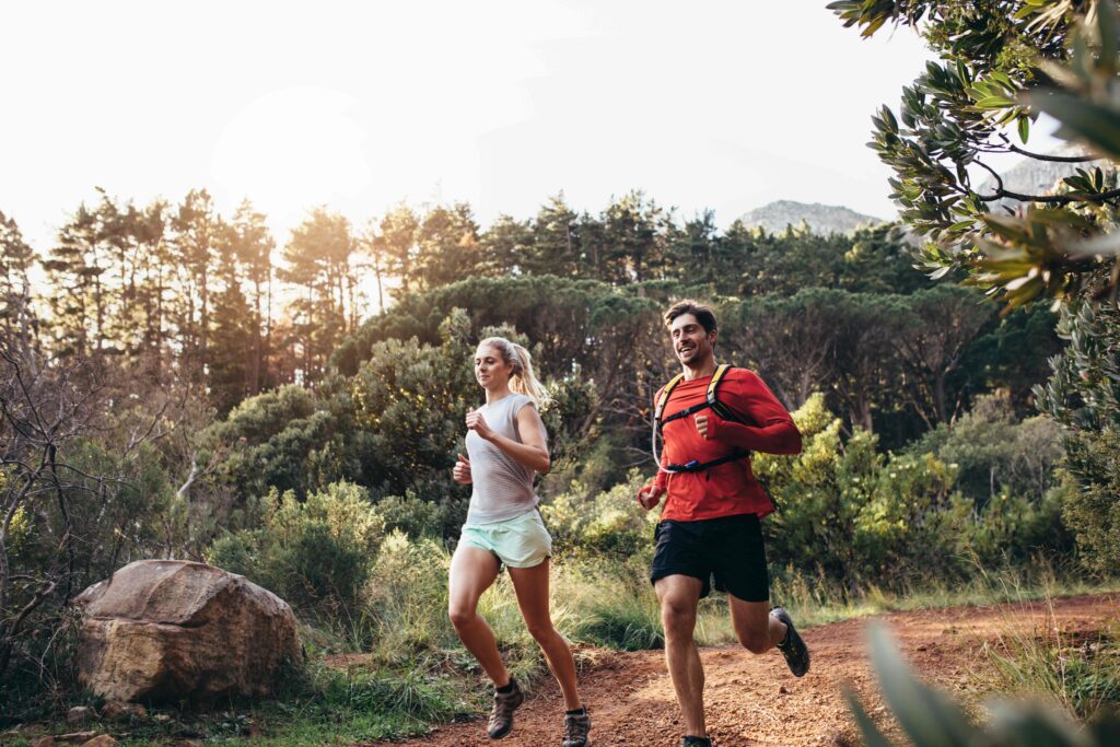 Couple Jogging At Sunrise