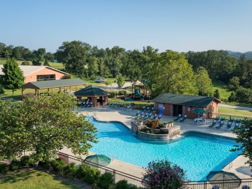 amenities with hot tub and outdoor and indoor pool