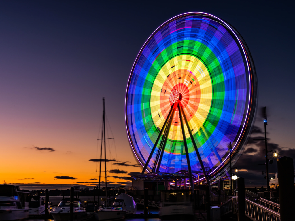 The Capital Wheel lit up at dusk in National Harbor, near Washington D.C.